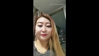 A Mature Asian Stepmother Indulges In Self-Pleasure